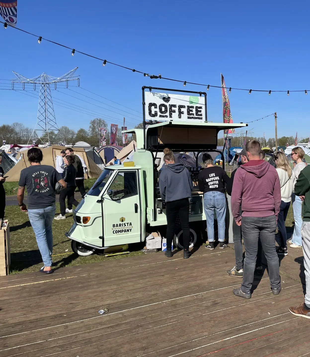 Piaggio ape mint groen op festival
