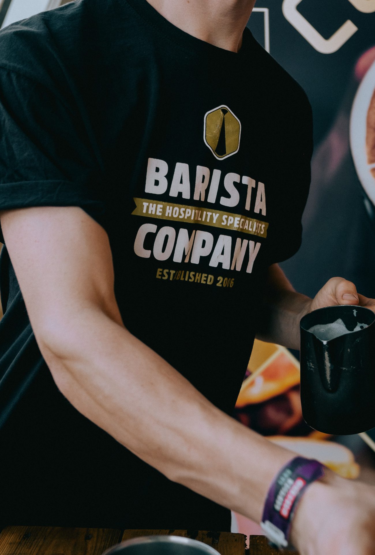 Man met Barista Company shirt